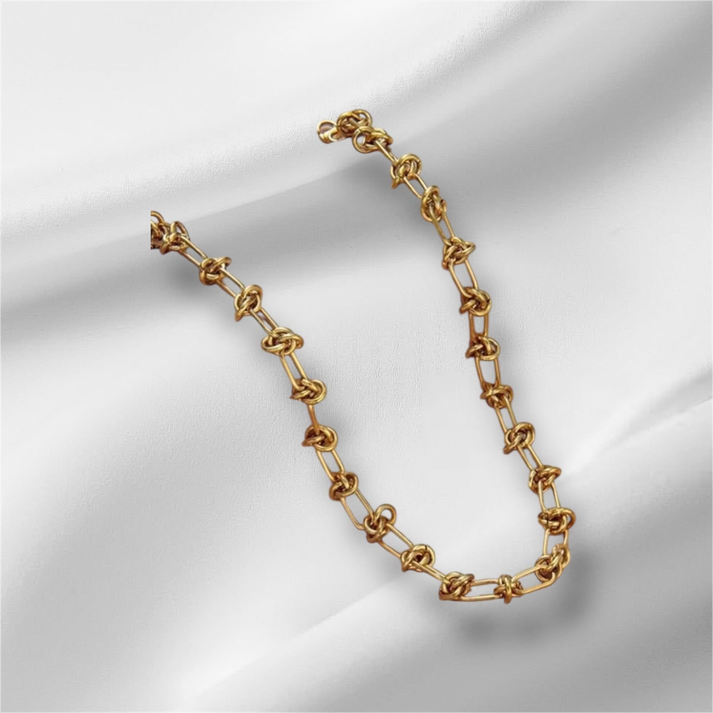 Collier noeuds Erika, acier inoxydable doré.