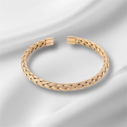 Bracelet Trycia tressé, acier inoxydable doré.