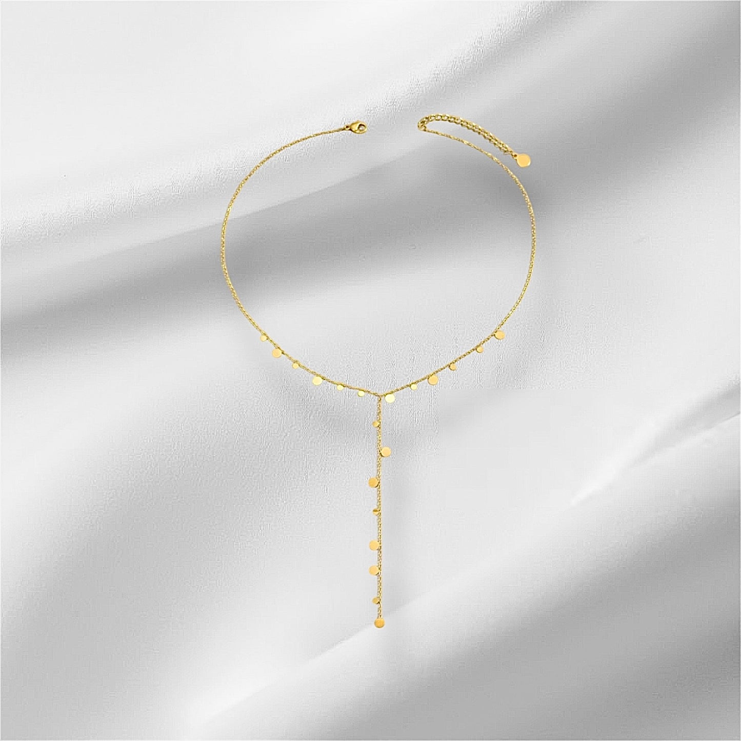Collier forme Y, Taylor pampilles rondes en acier inoxydable doré.