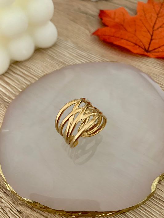 Bague Maya ligne tressé, acier inoxydable doré .